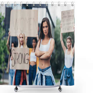 Personality  Serious Feminist Standing With Arms Closed Near Women Holding Placards With Feminist Slogans On Street Shower Curtains