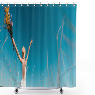 Personality  Selective Focus Of Woman In Straw Hat And White Dress Holding Wildflowers While Standing With Raised Hands, Panoramic Shot Shower Curtains