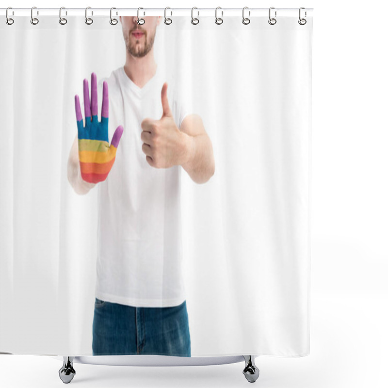 Personality  cropped image of homosexual man with hand painted in rainbow showing thumb up isolated on white shower curtains