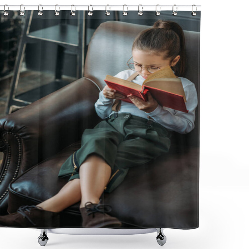 Personality  High Angle View Of Adorable Little Child Reading Book On Couch At Home Shower Curtains