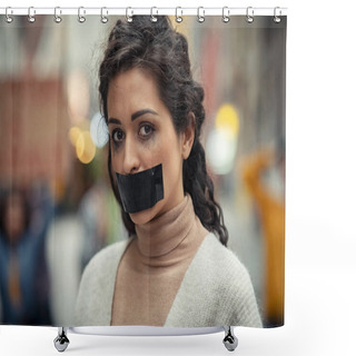 Personality  Portrait Of Young Latin Woman With Black Tape On Mouth Fighting Against Domestic Violence. Abused Girl Tired Of Harassment Looking At Camera. Speechless Indian Woman With Makeup Running In Female Abusive Violence Campaign On Street. Shower Curtains