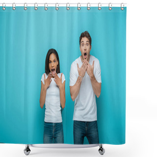 Personality  Shocked Interracial Couple Holding Hands Near Faces With Open Mouths While Looking At Camera On Blue Background Shower Curtains