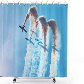 Personality  Three Light-engine Aircraft Perform Aerobatics - A Dead Loop. The Bright Sun Illuminates The Planes And The Shadows Fall On The Smoke They Leave In The Sky. Shower Curtains