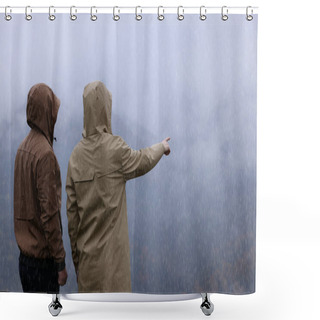 Personality  Man And Woman In Raincoats Enjoying Mountain Landscape Under Rain Shower Curtains