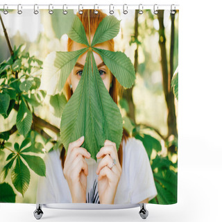 Personality  Obscured View Of Young Red Hair Woman Looking At Camera Behind Chestnut Leaf In Park Shower Curtains