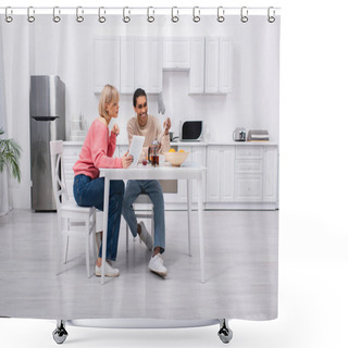 Personality  Cheerful African American Man Holding Newspaper Near Blonde Woman With Digital Tablet During Breakfast Shower Curtains
