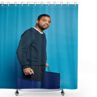Personality  Charming African American Man In 20s Standing Sideways With Shopping Bag In Hands On Blue Background Shower Curtains