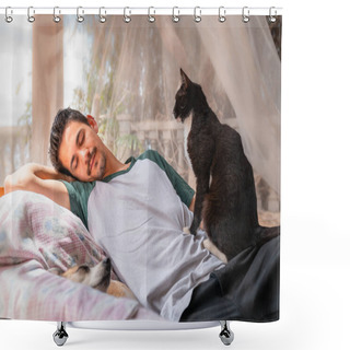 Personality  Young Man Reclining On An Armchair In The Garden Behind A Mosquito Net, Strokes A Black Cat Sitting On His Side Shower Curtains