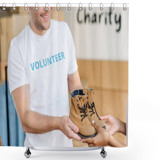 Personality  Cropped View Of Two Multicultural Volunteers Holding Childrens Shoes  Shower Curtains