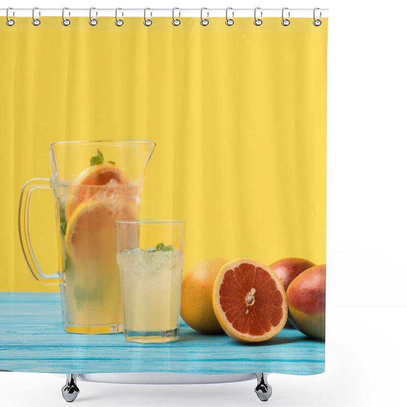 Personality  Close-up View Of Fresh Mangoes With Grapefruits And Cold Summer Drink In Glass And Jug On Yellow Shower Curtains