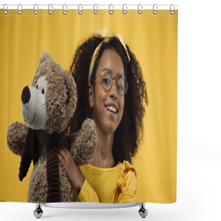 Personality  Happy African American Girl In Glasses Holding Teddy Bear Isolated On Yellow Shower Curtains