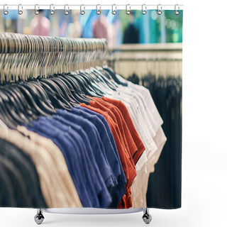 Personality  Interior Of Fashion Clothes Store With T-shirts On Hangers In Red, Blue And Other Colors. Shower Curtains