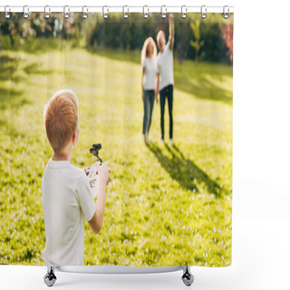 Personality  Boy Playing With Drone While Parents Standing Behind At Park Shower Curtains