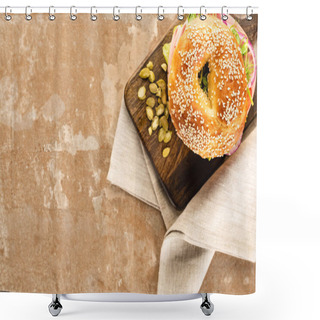 Personality  Top View Of Fresh Delicious Bagel On Wooden Cutting Board With Pumpkin Seeds On Aged Beige Surface With Napkin Shower Curtains