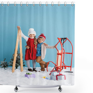 Personality  Girl In Winter Outfit Holding Skis And Hugging Brother Standing Near Sleight And Presents On Snow Isolated On Blue  Shower Curtains