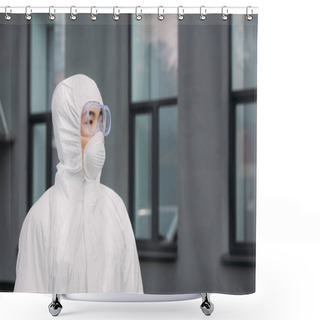 Personality  Asian Epidemiologist In Hazmat Suit And Respirator Mask Looking Away While Standing Near Building Shower Curtains