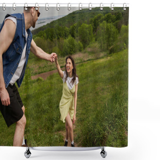 Personality  Stylish Bearded Man In Sunglasses Holding Hand Of Cheerful Brunette Girlfriend In Boots And Sundress While Walking On Green Hill, Couple In Love Enjoying Nature And Relaxing Concept Shower Curtains