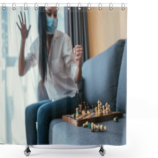 Personality  Selective Focus Of Angry, Depressed Woman In Protective Mask Crashing Chessboard While Sitting On Sofa  Shower Curtains
