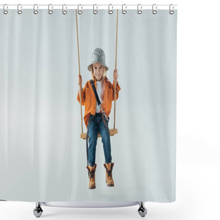 Personality  Cute Kid In Silver Hat, Jeans And Orange Shirt Sitting On Swing On Grey Background  Shower Curtains