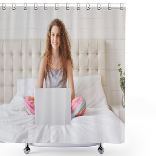 Personality  Positive Beautiful Female Uses Portable Laptop Computer For E Learning, Rests In Domestic Atmosphere At Bedroom, Dowloads Files From Networks Or Prepares For Project. Woman In Bedroom With Device Shower Curtains