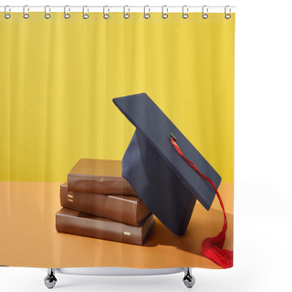 Personality  Brown Books And Academic Cap With Red Tassel On Orange Surface Isolated On Yellow Shower Curtains