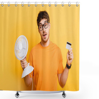 Personality  Thoughtful Young Man Holding Electric Fan And Credit Card On Yellow Shower Curtains