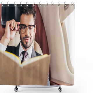 Personality  Selective Focus Of Handsome Businessman In Suit Reading Book In Private Plane  Shower Curtains