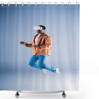 Personality  A Man With A Hat Jumps In The Air Within A Studio Setting While Wearing A VR Headset For Metaverse Exploration. Shower Curtains