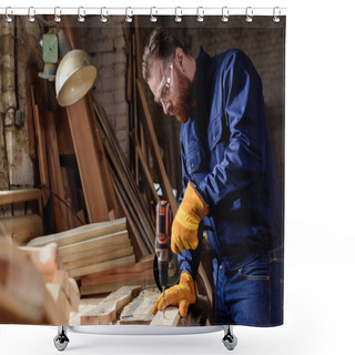 Personality  Bearded Carpenter In Protective Gloves And Googles Using Electric Drill At Sawmill Shower Curtains