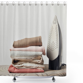 Personality  Iron And Folded Ironed Clothes On Ironing Board Isolated On Grey Shower Curtains