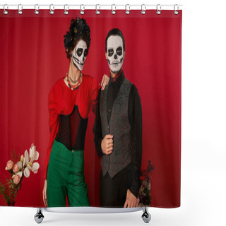Personality  Stylish Dia De Los Muertos Couple In Sugar Skull Makeup Looking At Camera Near Flowers On Red Shower Curtains