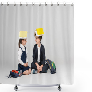 Personality  Happy Schoolkids In Uniform With Books On Heads Sitting And Looking At Each Other On Grey Shower Curtains