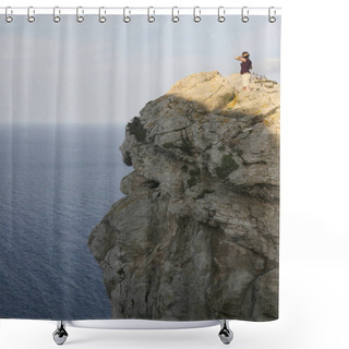 Personality  High Above The Endless Blue Sea, A Solitary Figure Stands On A Rugged Cliff, Immersed In The Act Of Capturing The Horizon Shower Curtains