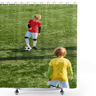 Personality  A Young Boy Energetically Kicks A Soccer Ball On A Lush Green Field, Showcasing His Talent And Passion For The Sport. Shower Curtains