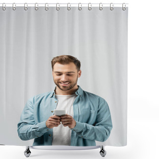 Personality  Smiling Young Man Using Smartphone Isolated On Grey Shower Curtains
