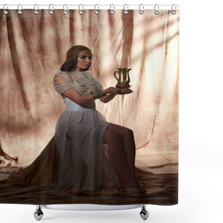 Personality  Woman In Traditional Egyptian Outfit Holding Golden Jug While Sitting On Abstract Background Shower Curtains