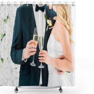Personality  Cropped View Of Groom And Bride Holding Glasses Of Champagne On White Floral Background Shower Curtains