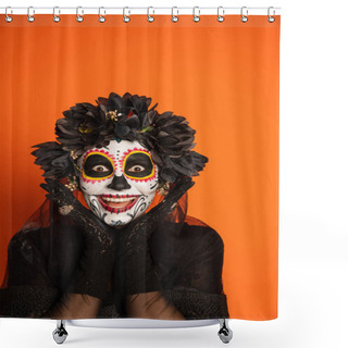 Personality  Excited Woman In Spooky Halloween Makeup And Black Wreath Holding Hands Near Face And Looking At Camera Isolated On Orange Shower Curtains