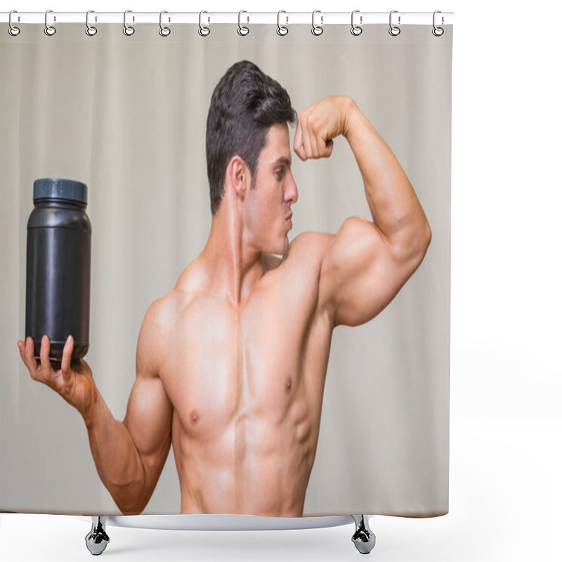 Personality  Muscular man posing with nutritional supplement in gym shower curtains