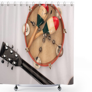 Personality  Top View Of Acoustic Guitar Near Wooden Maracas On Tambourine On White Background Shower Curtains