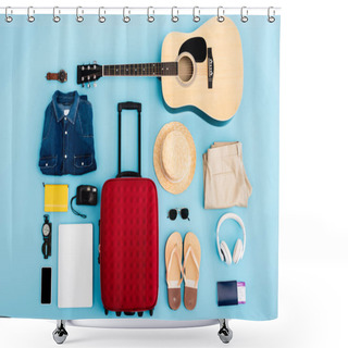 Personality  Top View Of Sunglasses, Clothing, Accessories And Devices Near Red Luggage On Blue Shower Curtains