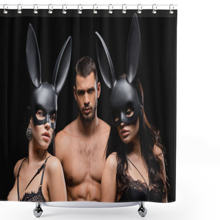 Personality  Passionate Women In Underwear And Bunny Masks Near Sexy Man On Blurred Background Isolated On Black Shower Curtains