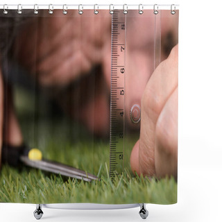 Personality  Close-up Of A Man Using Measuring Scale While Cutting Grass With Scissors Shower Curtains