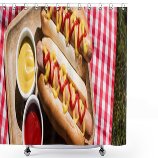Personality  Top View Of Wooden Tray With Hot Dogs And Sauces On Plaid Table Napkin And Green Grass, Banner Shower Curtains