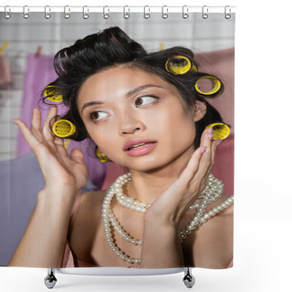 Personality  Pensive Young Asian Woman Touching Hair With Hair Curlers And Posing In Pearl Necklace Near Clean And Wet Laundry Hanging On Blurred Background, Housework, Housewife, Looking Away Shower Curtains