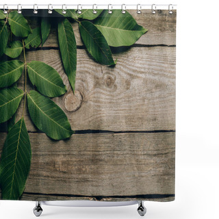 Personality  Top View Of Beautiful Green Walnut Leaves On Wooden Table  Shower Curtains