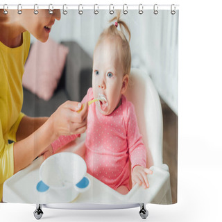 Personality  Selective Focus Of Woman Feeding Baby Girl On Highchair At Home  Shower Curtains