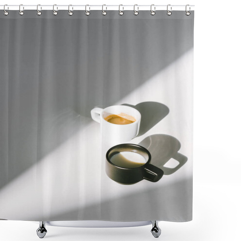 Personality  High Angle View Of Black And White Cups Of Milk And Coffee On White Surface Shower Curtains