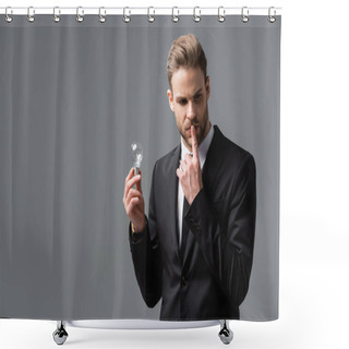Personality  Pensive Businessman Touching Lips While Holding Light Bulb Isolated On Grey Shower Curtains