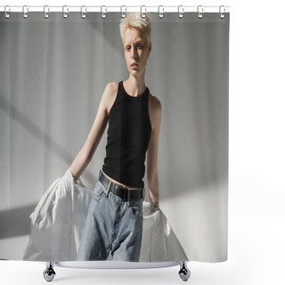 Personality  Tattooed Albino Woman In Black Tank Top And Jeans Taking Off White Shirt On Grey Background Shower Curtains